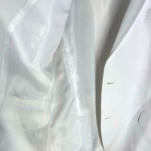 Two-piece cotton and linen blend. Recently dry cleaned and only worn twice.